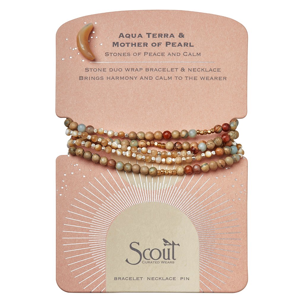 Stone duo wrap on Scout branded card. Stone crescent moon pin is attached to corner. The properties of the stones are written on the card.
