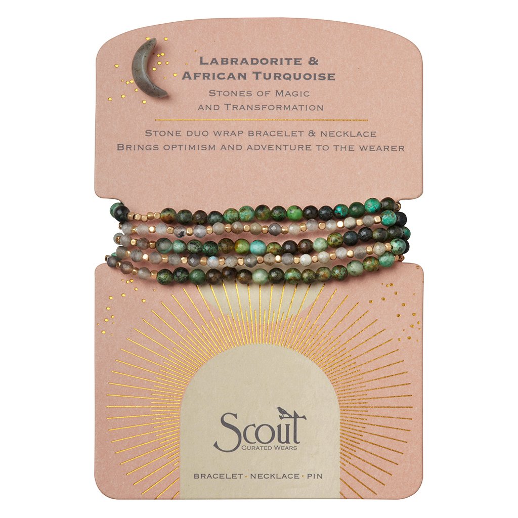 Stone duo wrap on Scout branded card. Stone crescent moon pin is attached to corner. The properties of the stones are written on the card.