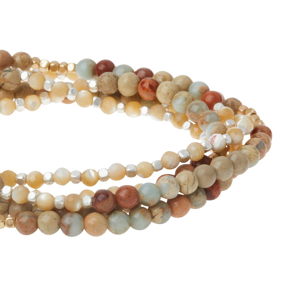 Close up of aqua terra and mother of pearl stone duo wrap