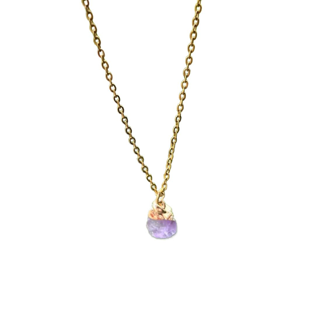 Purple amethyst crystal pendant on gold chain