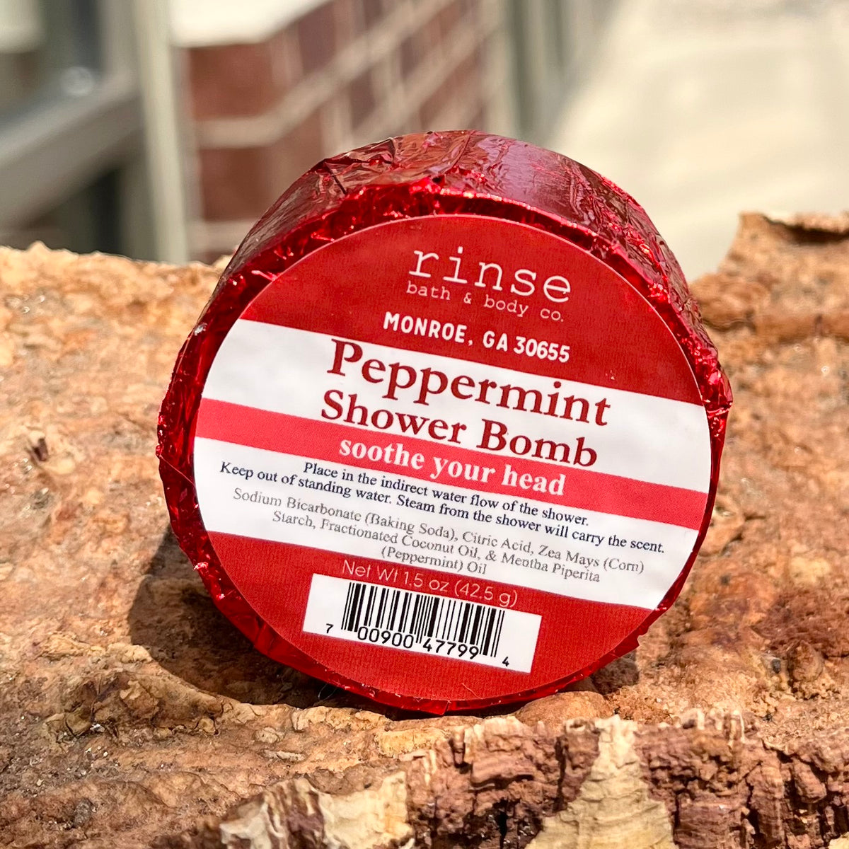 Peppermint shower bomb in shing red wrapper