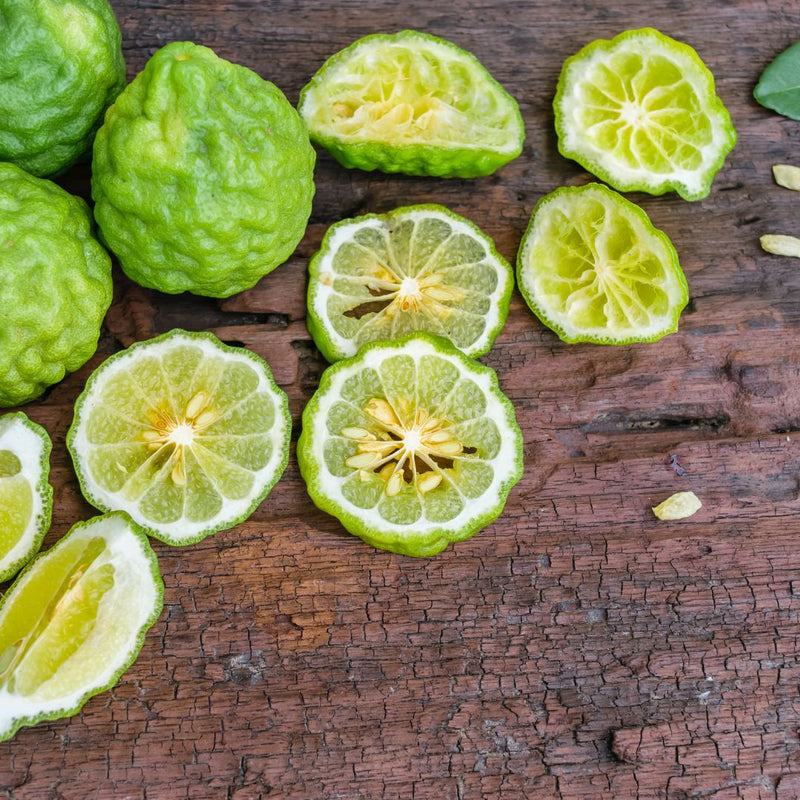 Green bergamot fruit and bergamot slices