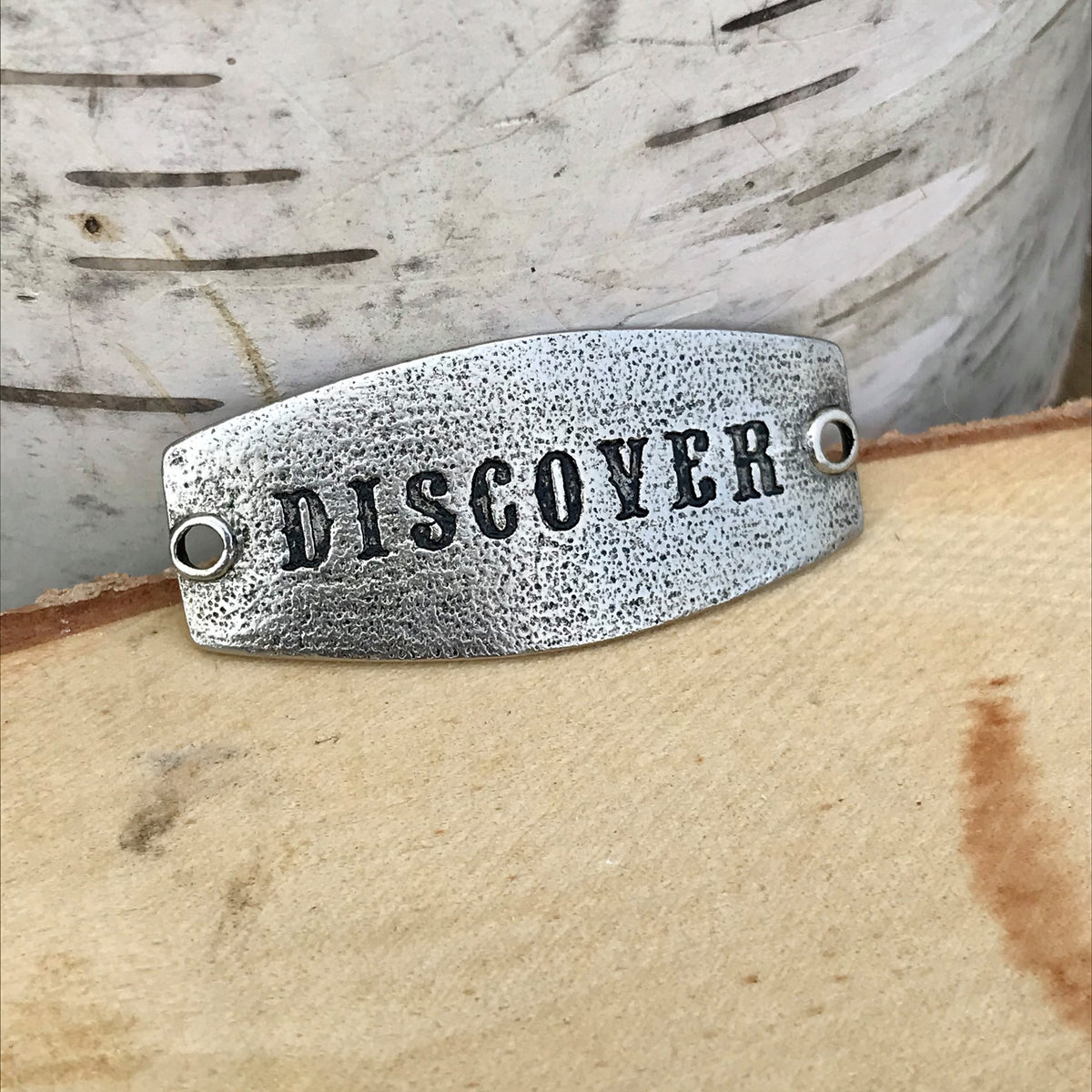 antique silver Lenny & Eva sentiment stamped with DISCOVER
