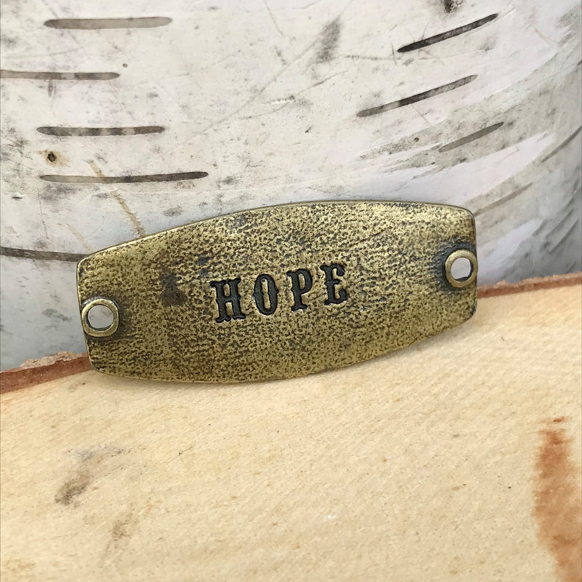 antique brass Lenny & Eva sentiment stamped with HOPE