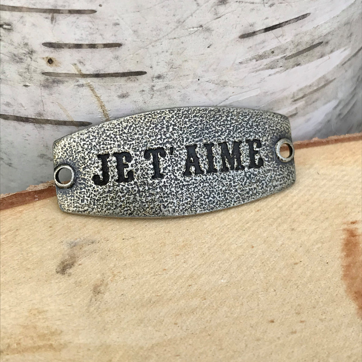 antique brass Lenny & Eva sentiment stamped with JE'TAIME
