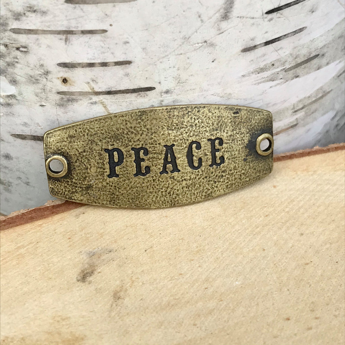 antique brass Lenny & Eva sentiment stamped with PEACE