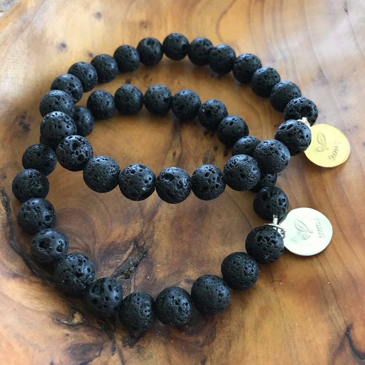 Pair of Black Lava Rock Essential Oil Aromatherapy Diffuser Bracelets by Lotus Jewelry Studio