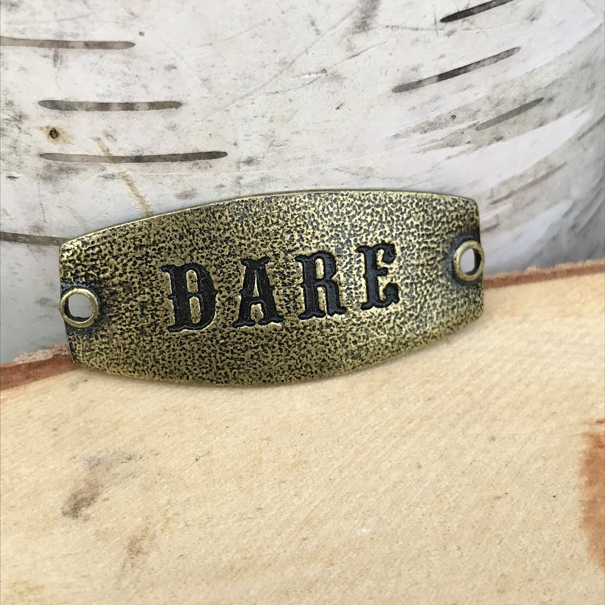 antique brass Lenny & Eva sentiment stamped with DARE