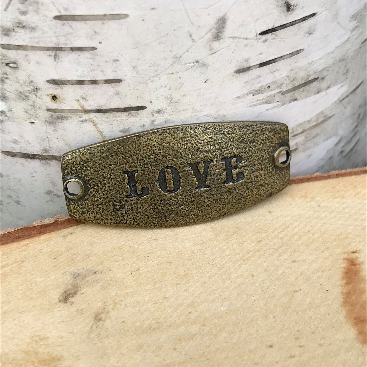 antique brass Lenny & Eva sentiment stamped with LOVE