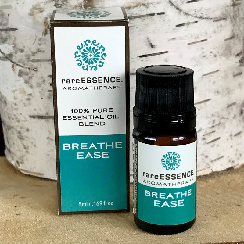 Breathe Ease 100% pure essential oil blend. Dark amber glass bottle with green label.