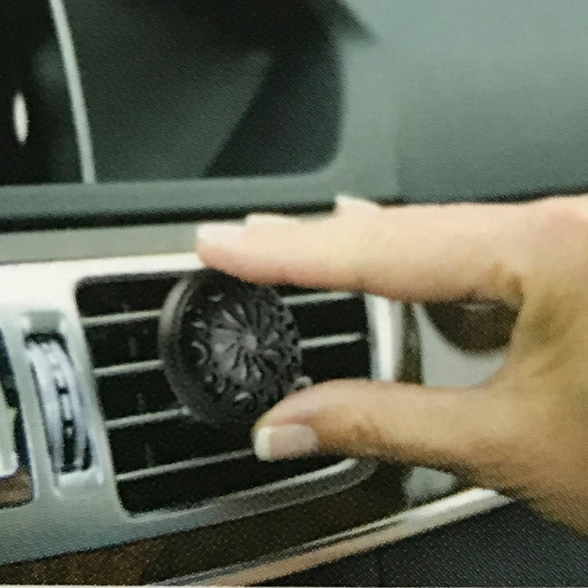 Car diffuser for essential oils. Just add a couple drops of your favorite essential oil and slide the diffuser onto your air vent.