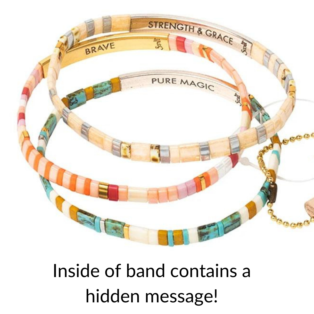 Trio of Scout Curated Wears Good Karma bracelets showing the messages on the inside band of the bracelets