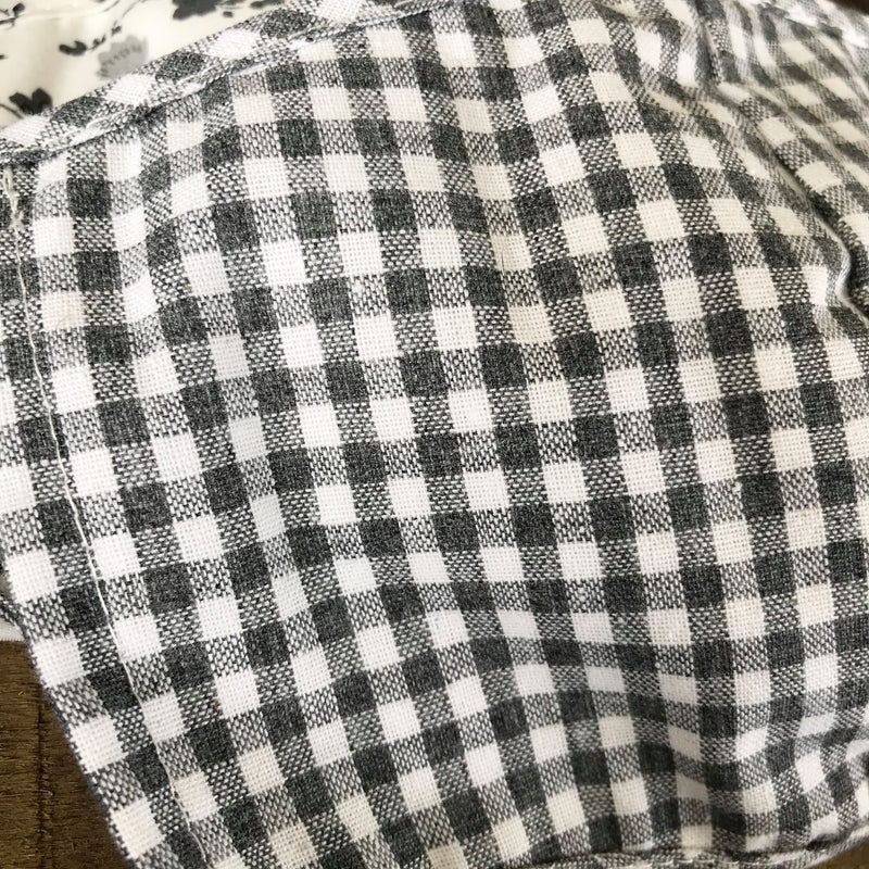 Close up view of the cute and neutral gray and white checked print.
