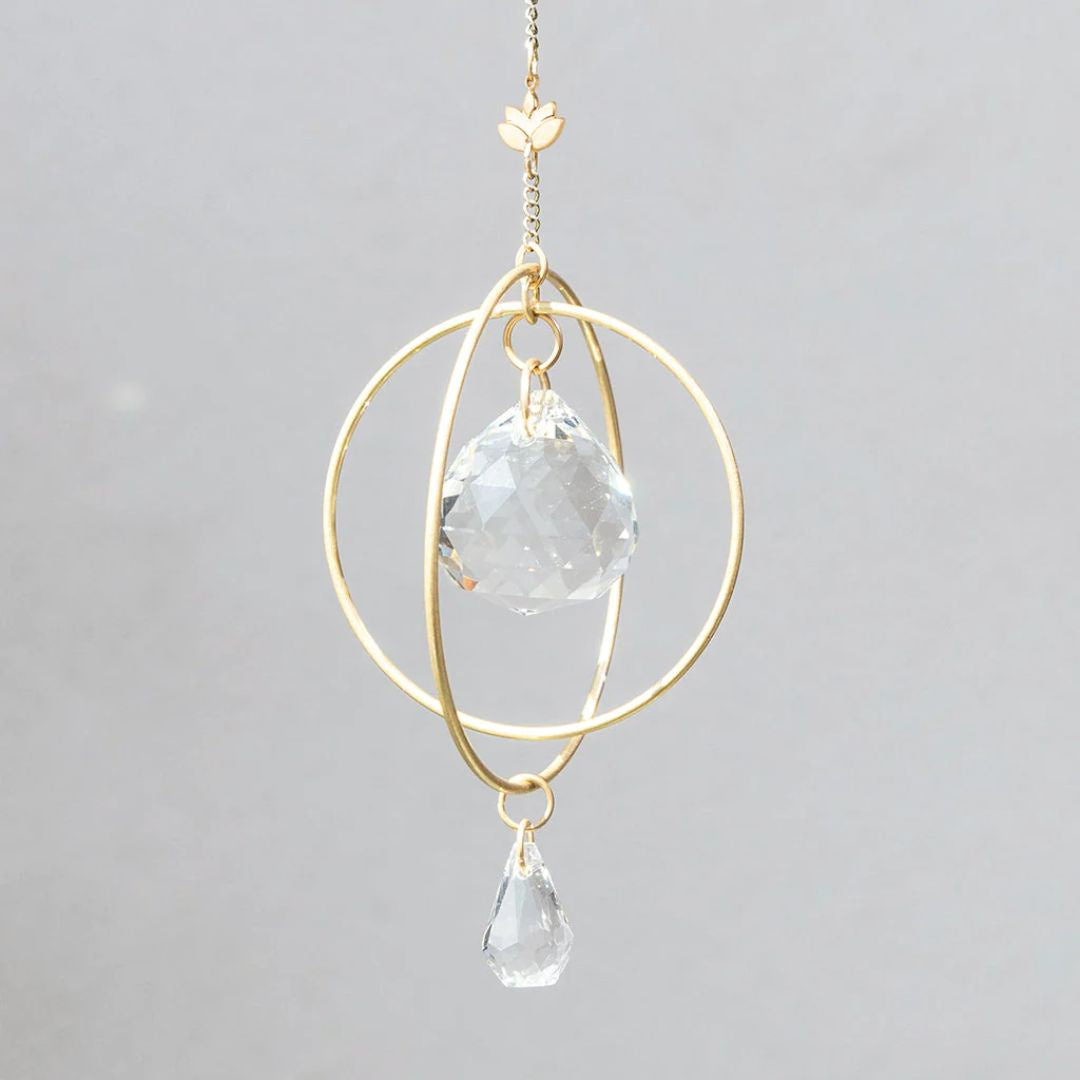 Mini gold suncatcher with gold rings and clear crystals. 