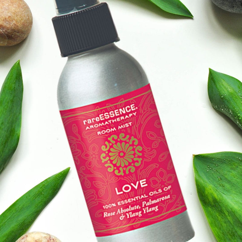 Spray bottle of Rare Essence Love blend essential oil mist.