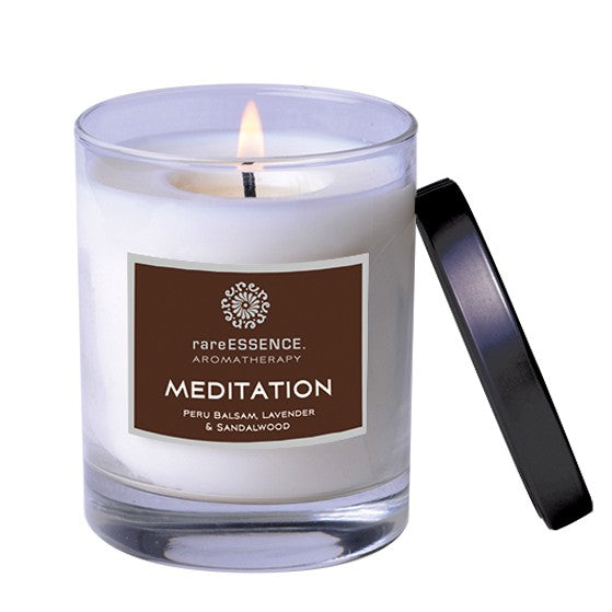 Meditation essential oil candle by Rare Essence in clear jar.
