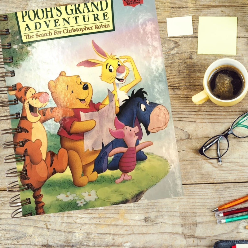 Pooh's Grand Adventure book turned into a spiral bound journal
