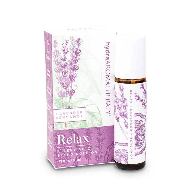 The Relax roll on is a blend of lavender and bergamot essential oils. The bottle is decorated with a purple bergamot fruit and lavender plant design.