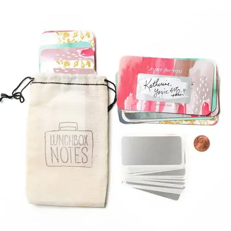 Cotton bag with "Lunchbox Notes" stamped on it and notecards sticking out the top
