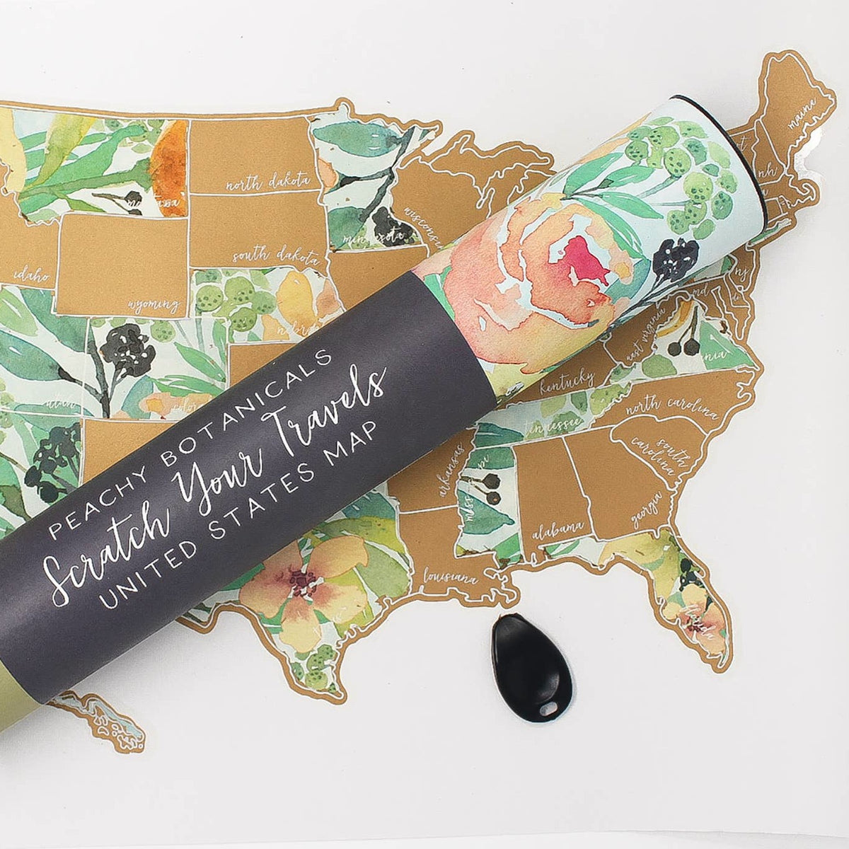 United States scratch off map with a peach botanical print on the states scratched off. Comes in a canister tube.