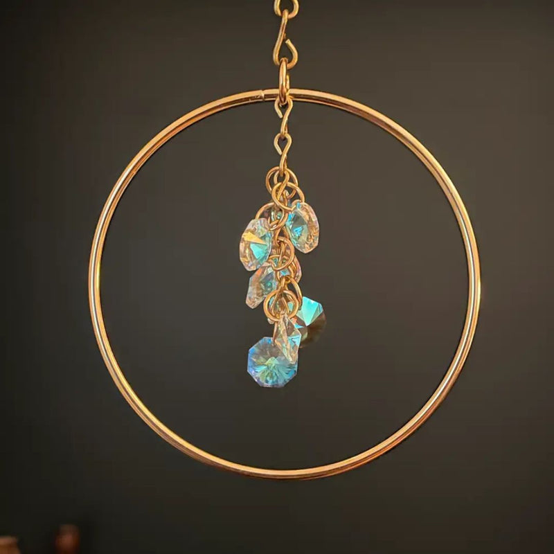 Brass circle sun catcher with aurora borealis crystal cluster