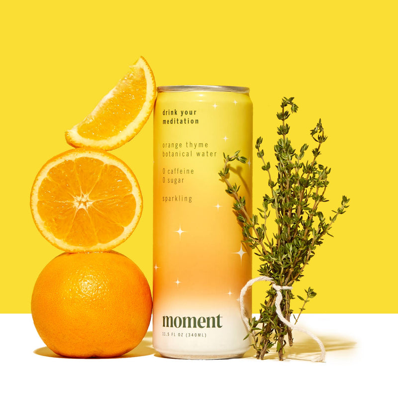 Tall skinny can of Orange Thyme Sparkling Botanical Water with yellow and orange label