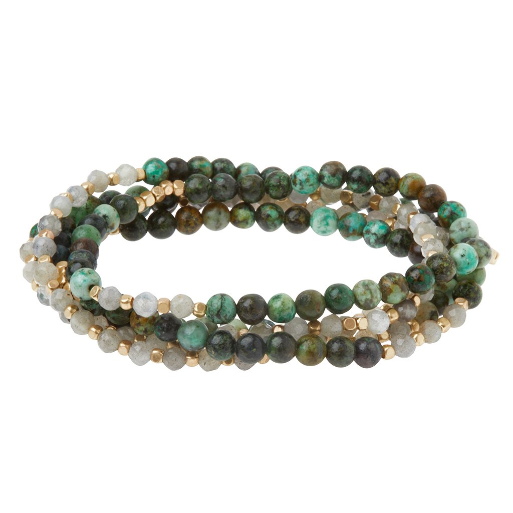 Wrap bracelet with larger green, turquoise and black swirled African turquoise beads and smaller milky colored labradorite beads beads