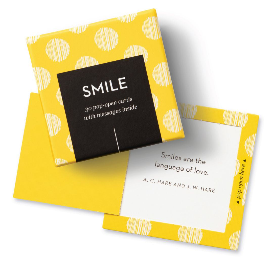 "Smile" boxed set has a yellow background with white striped dots