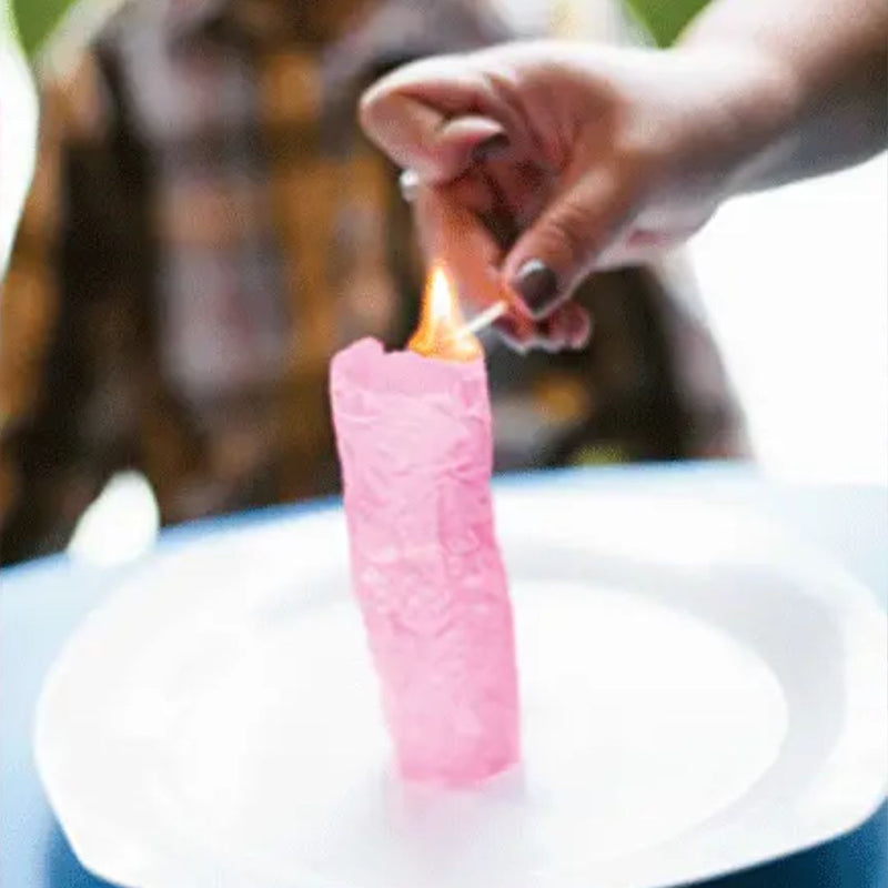 Lighting a pink wish paper