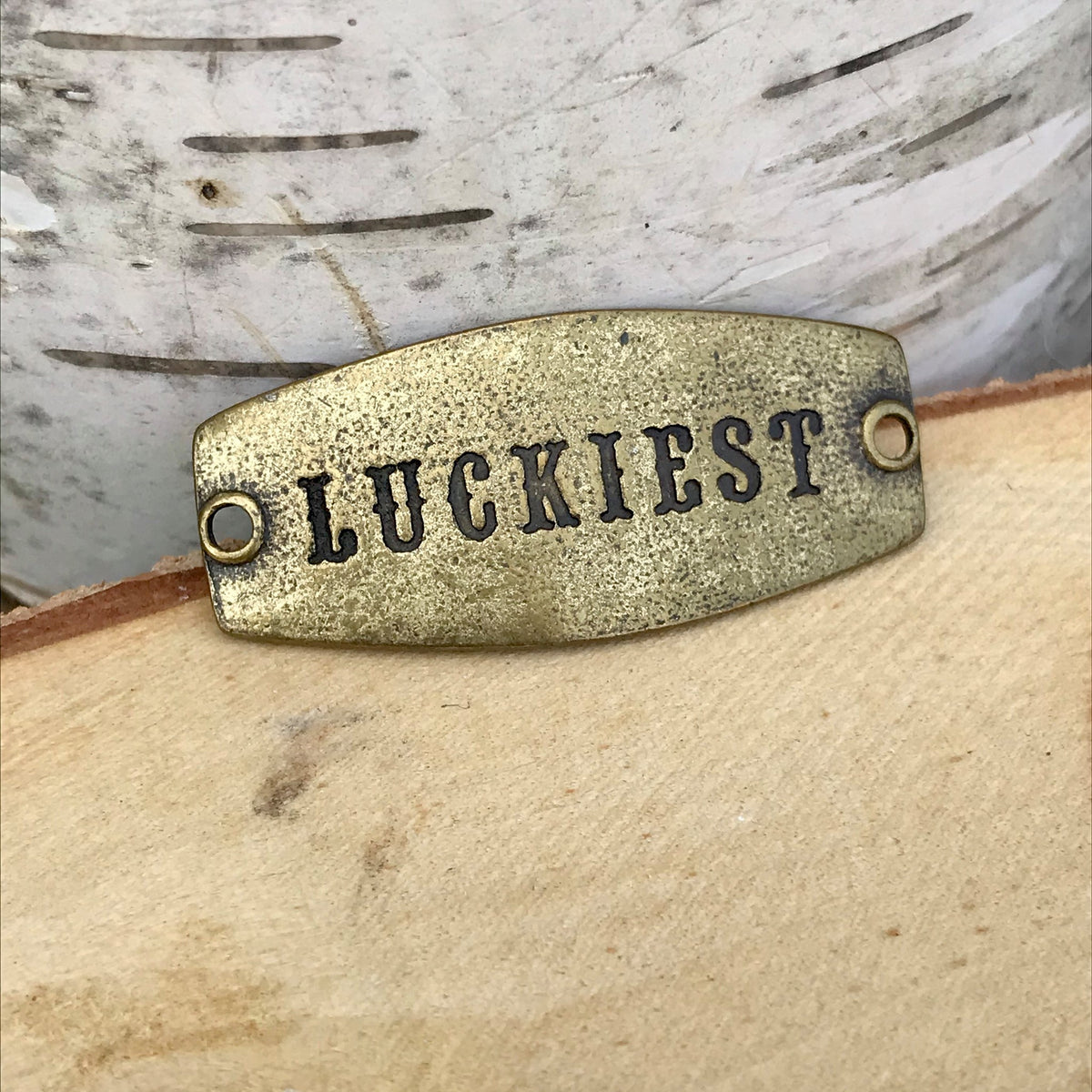 antique brass Lenny & Eva sentiment stamped with LUCKIEST