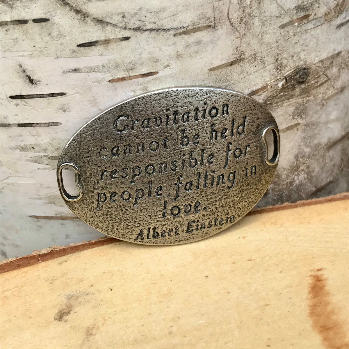 "Gravitation cannot be held responsible for people falling in love." -Albert Einstein (silver)