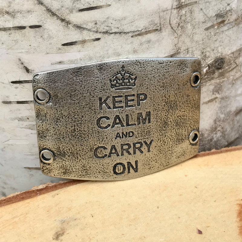 Antique silver toned Lenny & Eva bracelet sentiment that reads, "Keep calm and carry on" Design of crown above quote.