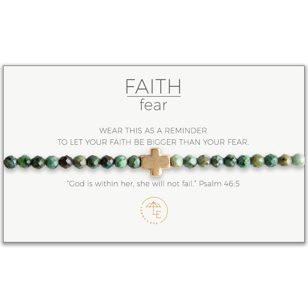 Bracelet with green African Turquoise beads with a gold cross on a card that reads, "wear this as a reminder to let your faith be bigger than your fear"