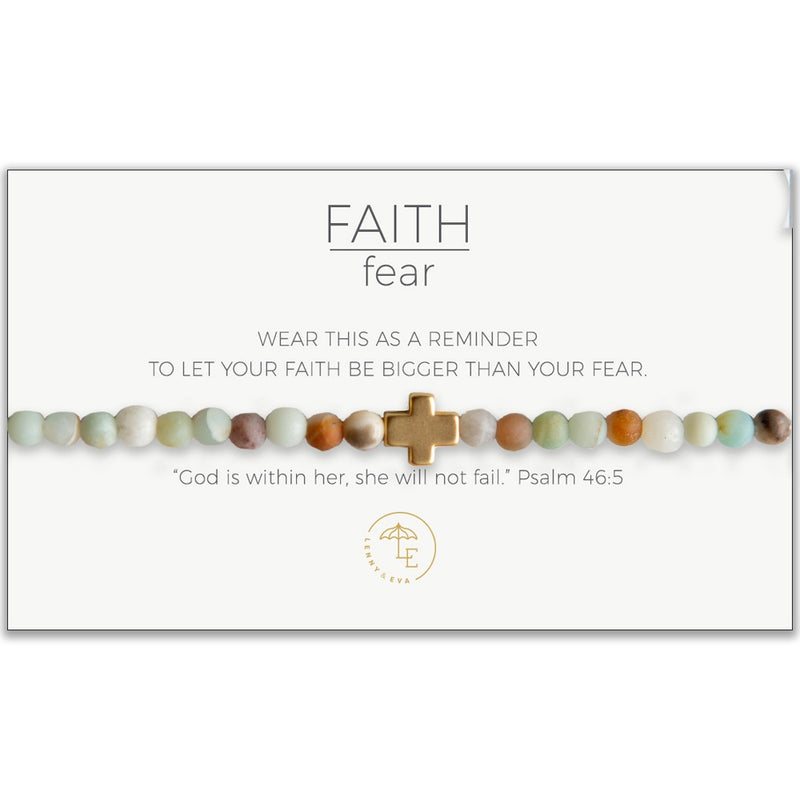 Bracelet with green, orange, brown, and white Amazonite beads with a gold cross on a card that reads, "wear this as a reminder to let your faith be bigger than your fear"