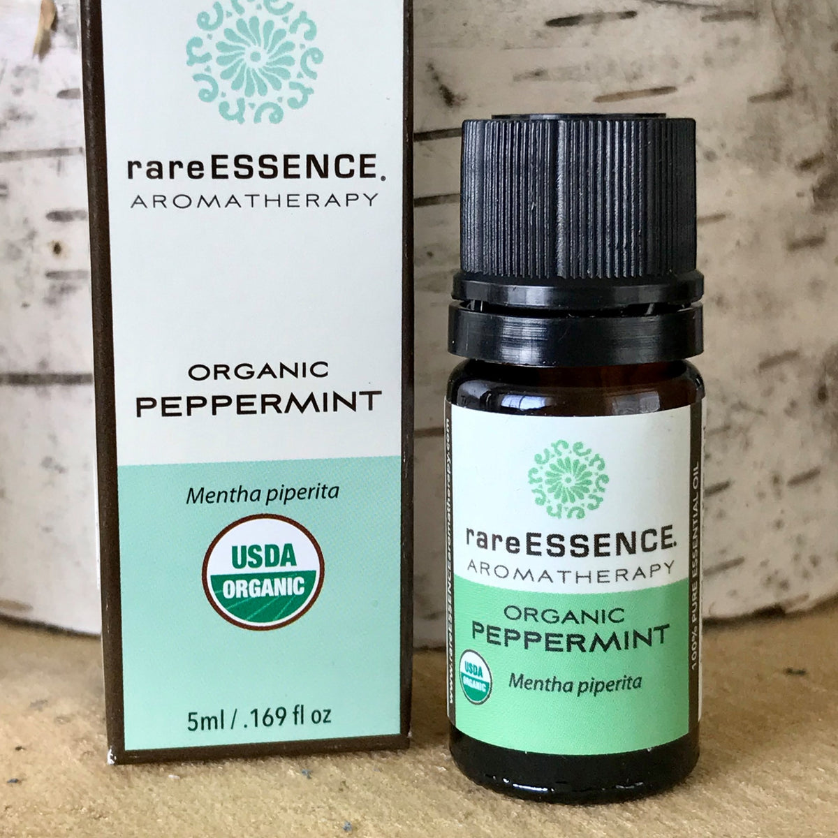 Bottle of organic Peppermint essential oil by Rare Essence